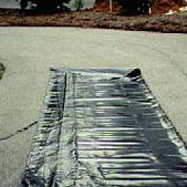 This picture shows the plastic Avanty Construction uses to seal dirt crawl spaces. First we stretch out the plastic and then cut it to size.